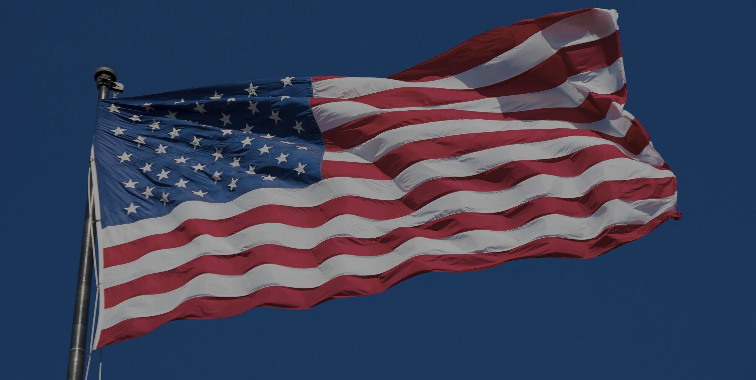 Corvalent american flag blue sky usa special photographic processing scaled e1753219630344